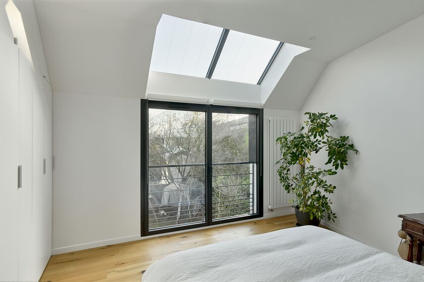 ThermoSystem 68 Fenêtres, SlimPatio 68 Coulissants et ThermoRoof 200 Vérandas - Extension à Malakoff : confort et lumière situé à Malakoff, France