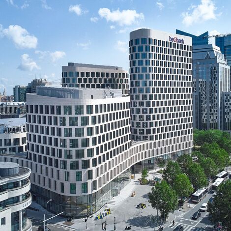 Futuristic white office building with curves in Brussels.