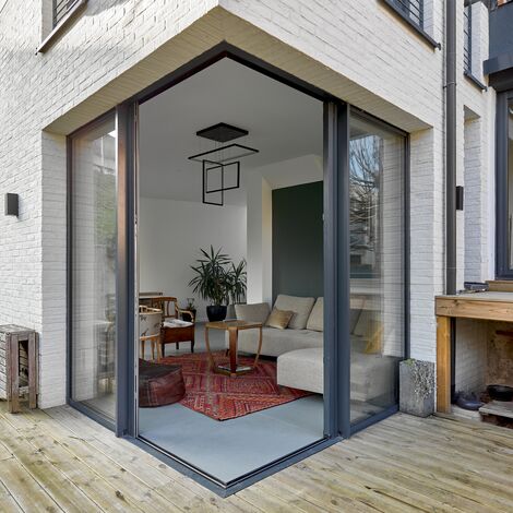 ThermoSystem 68 Fenêtres, SlimPatio 68 Coulissants et ThermoRoof 200 Vérandas - Extension à Malakoff : confort et lumière situé à Malakoff, France