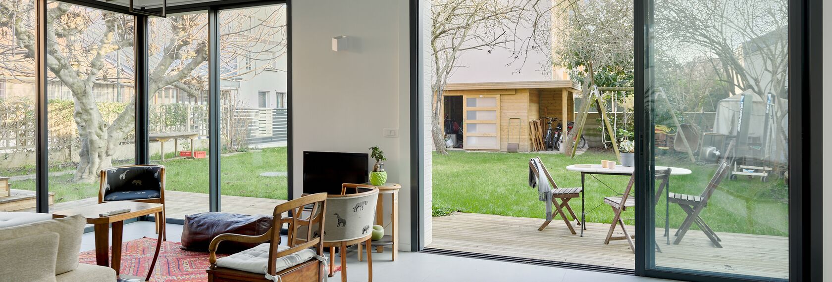 ThermoSystem 68 Fenêtres, SlimPatio 68 Coulissants et ThermoRoof 200 Vérandas - Extension à Malakoff : confort et lumière situé à Malakoff, France