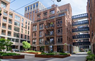 Brick and steel building in modern city quarter.